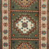 Green Kazak area rug