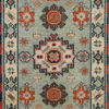 Green Kazak area rug