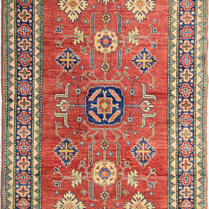 Red oriental Kazak rug