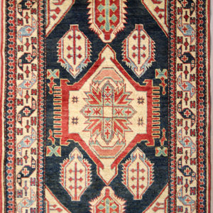 navy blue Kazak rug
